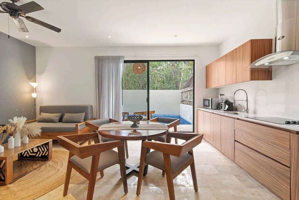 Dining Elegance - Serve up meals at the elegant dining table, designed for easy entertaining and delightful dining.
