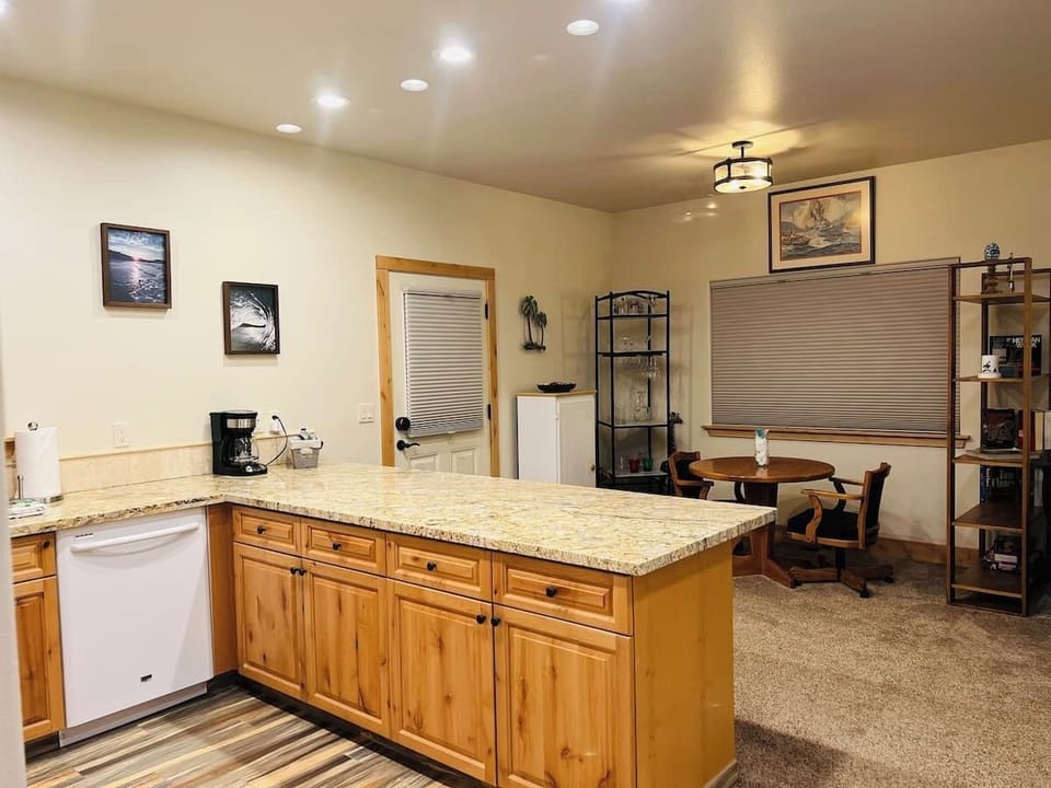 Kitchen counter and dining area.  Also a good computer station.