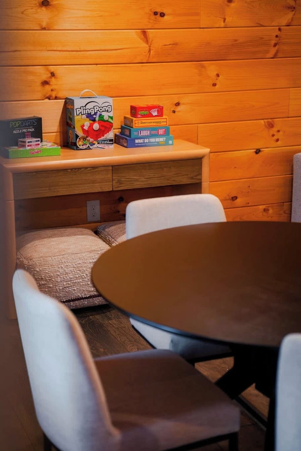 Dining Area: Gather around for game nights and great meals, surrounded by warm wooden charm!