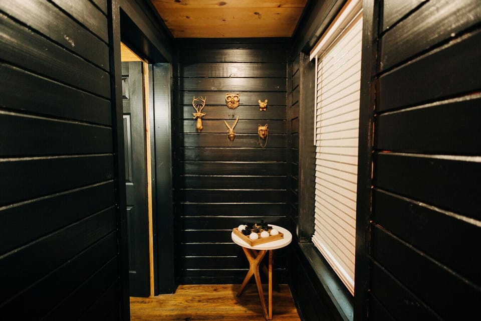 Modern decor just steps away from the bathroom directly connected to the game room.