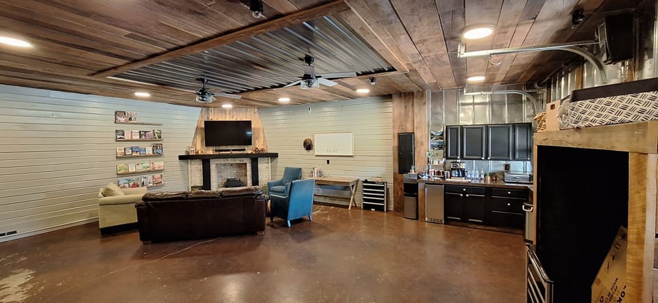 Rec room in main house. Dart board, ring toss game, Game closet with many games.