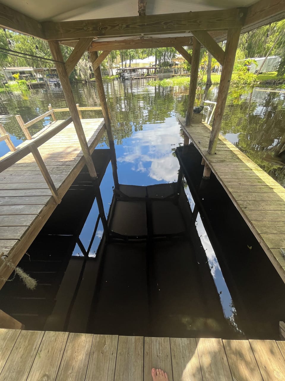 Covered dock 7'7" wide, 6'6" dock to roof.