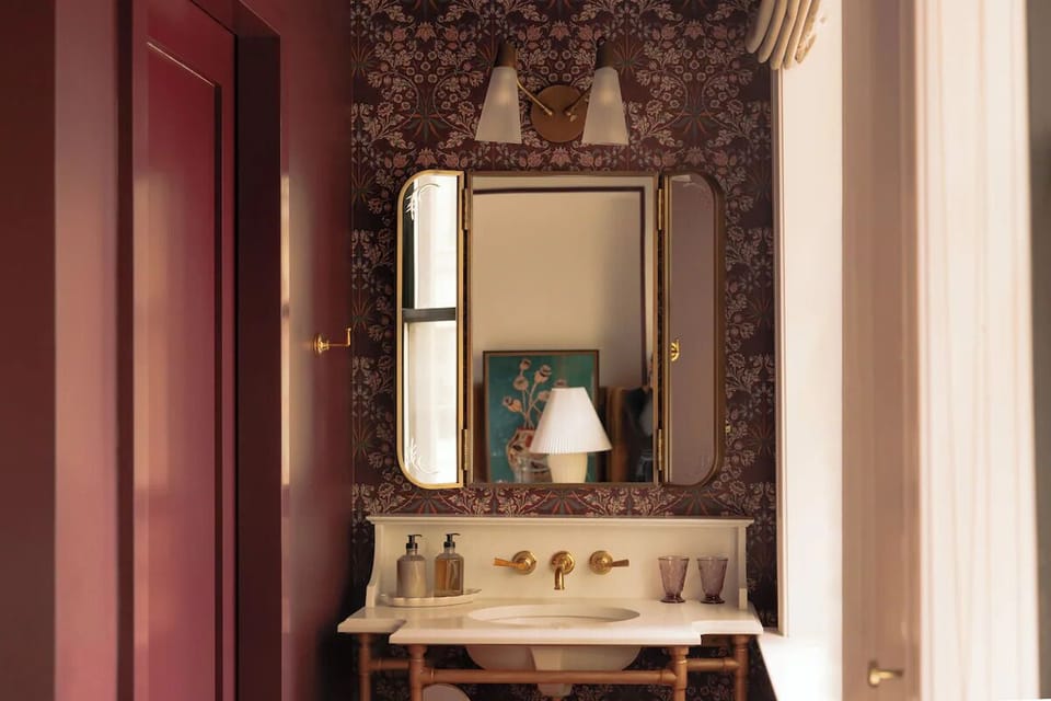 Pamper yourself at a vintage-inspired vanity with soft, flattering light.