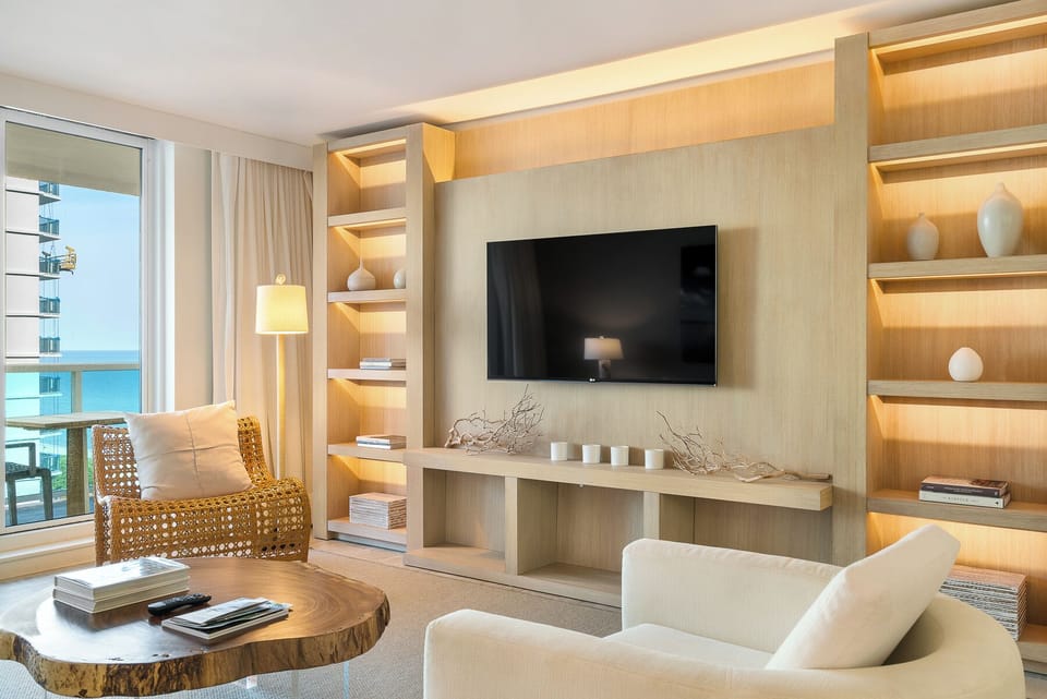 A living room with a unique coffee table made from a tree 
