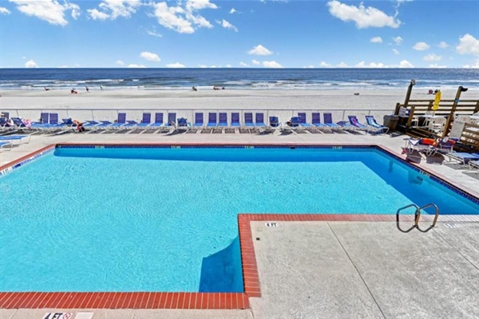 Beachside swimming pool Refreshing area perfect for family fun and relaxation