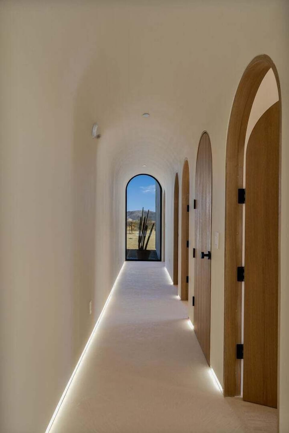 Hallway with arched ceilings.