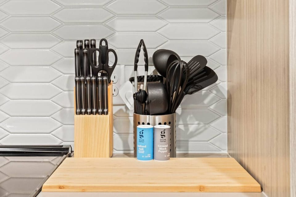 Fully equipped kitchen with all the tools you need for a perfect culinary experience. Enjoy the convenience of having everything at your fingertips!