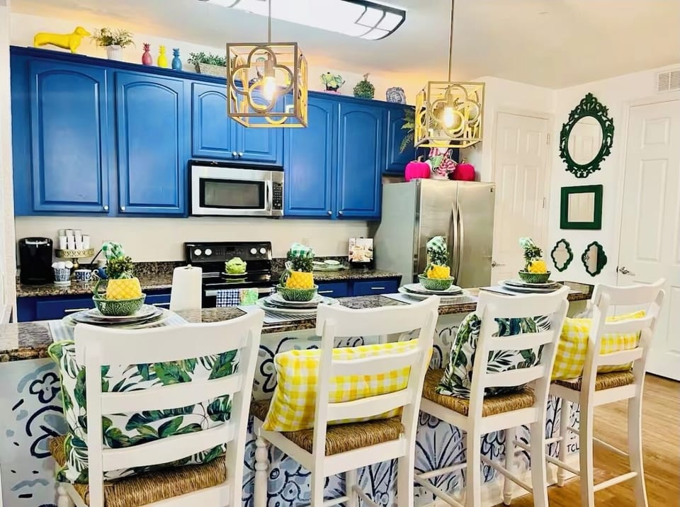 Bar area in kitchen with barstool seating for 4