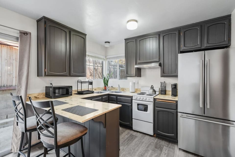 Full kitchen with all cooking and dining essentials