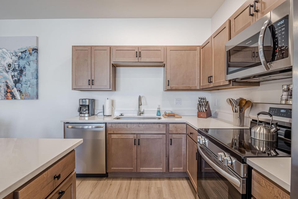 Morning coffee, made easy! Start your day with a fresh cup in a bright, welcoming kitchen.