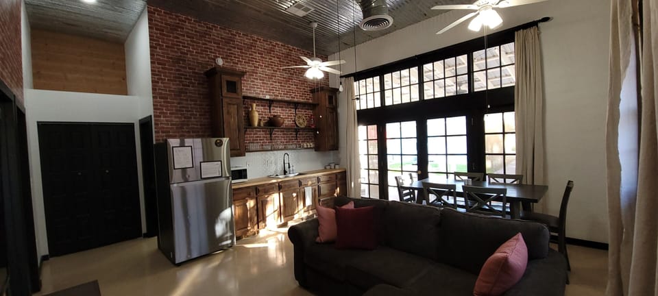 high industrial ceilings with lots of ceiling fans 