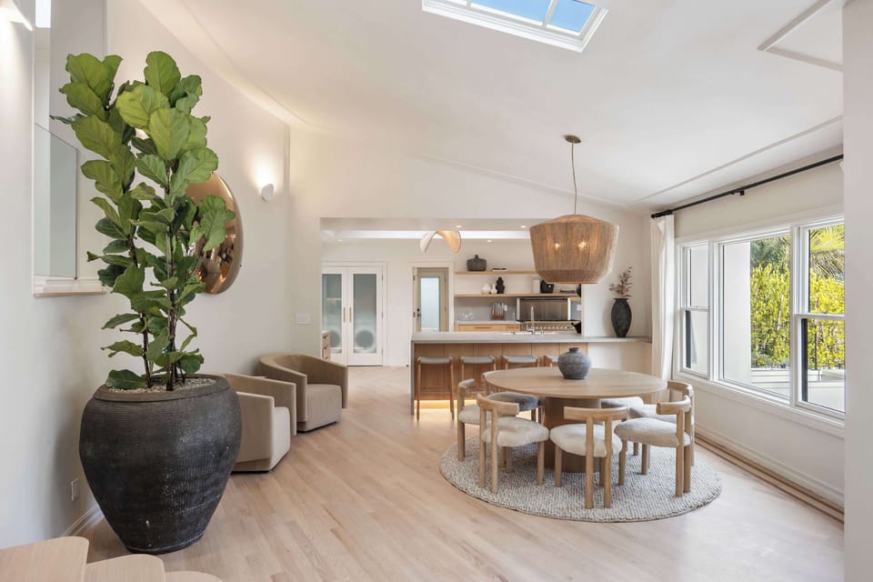 Share memorable meals in a sunlit dining space with designer charm.