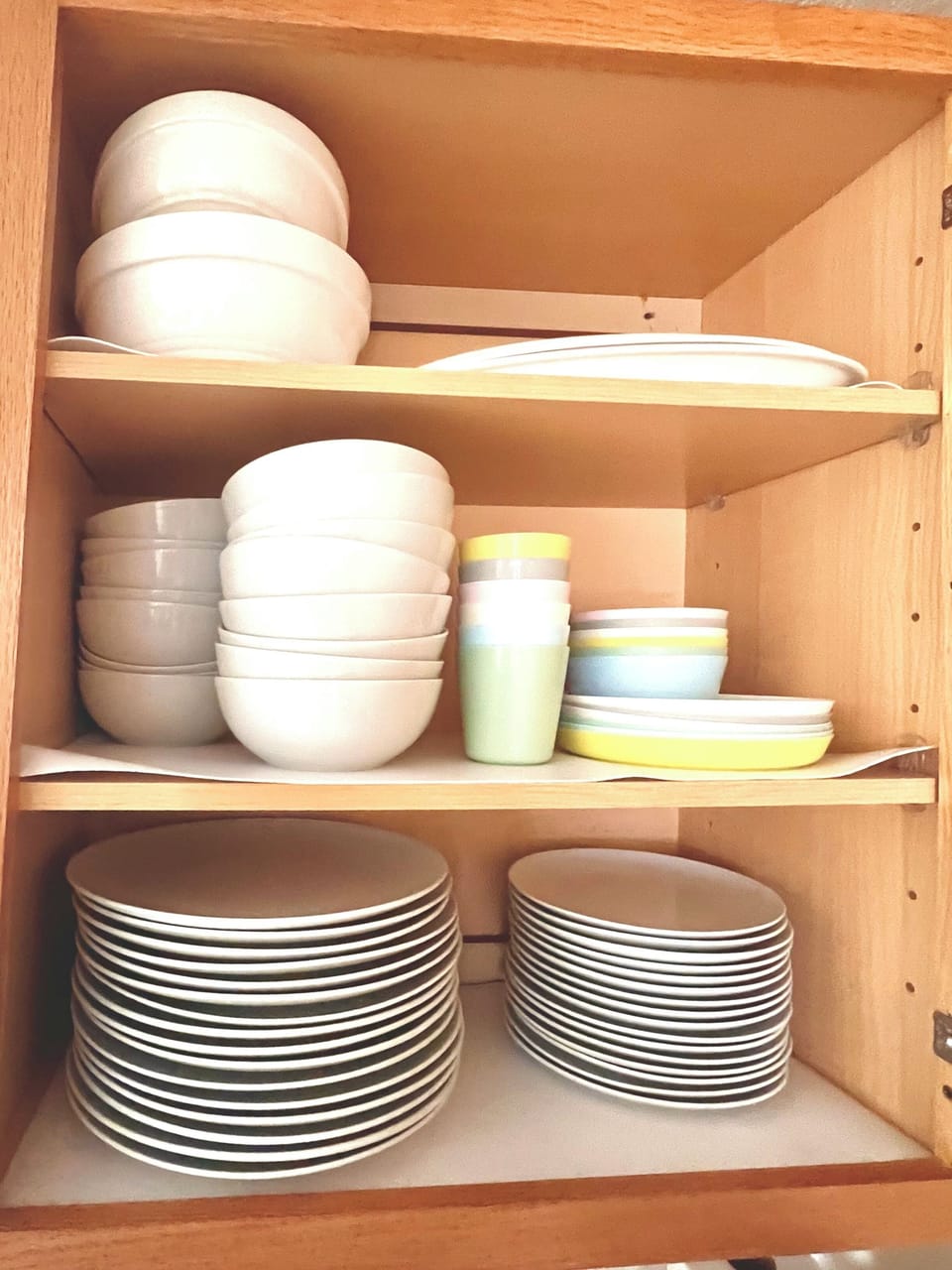Dishes enough for everyone and plastic ones for the kids.  High chair in closet.