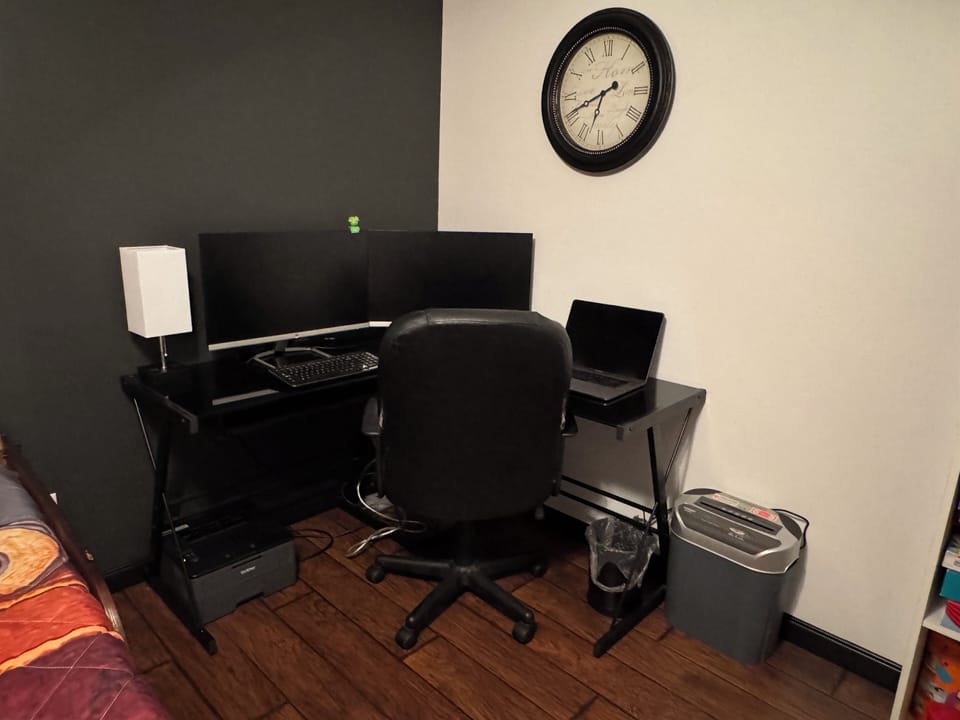 Work space with 27" monitor. HDMI cable provided.
