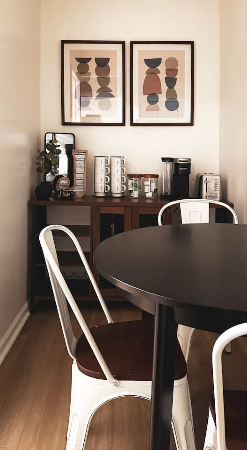 The dining room is bathed in natural light, creating a bright and inviting space where every meal feels special.