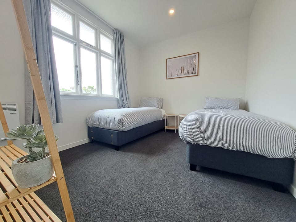 Second bedroom set up as 2x Singles. This can be set up as 1x King bed, provided we have advance notice.