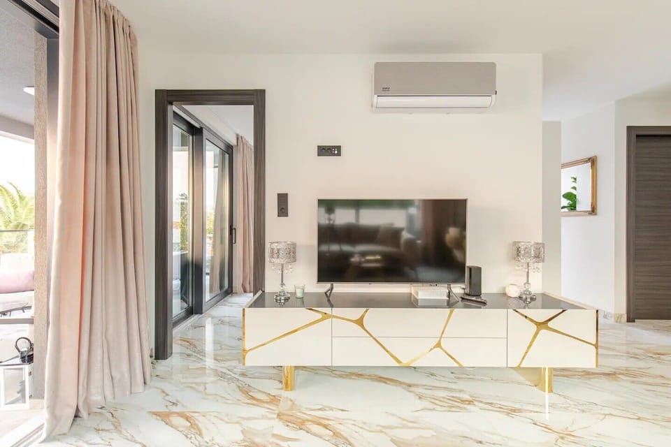 Living room with SAT TV in Luxury Villa Destiny Ciovo 1 with heated pool at the beach
