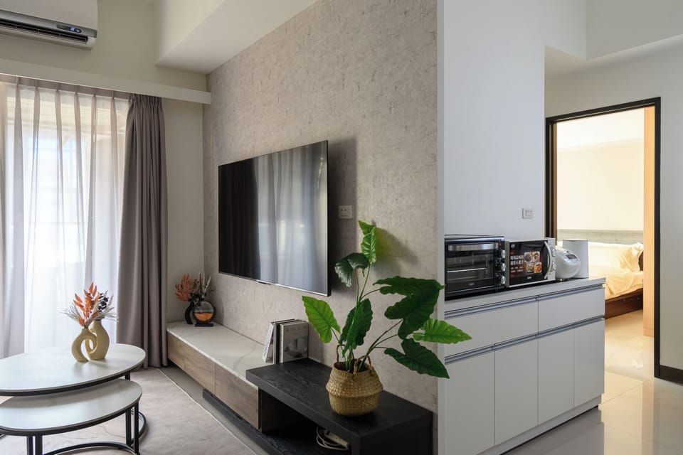 Cozy & Stylish Living Room:
• 65" Smart TV w/Channels
• Open Space w/Dining Area