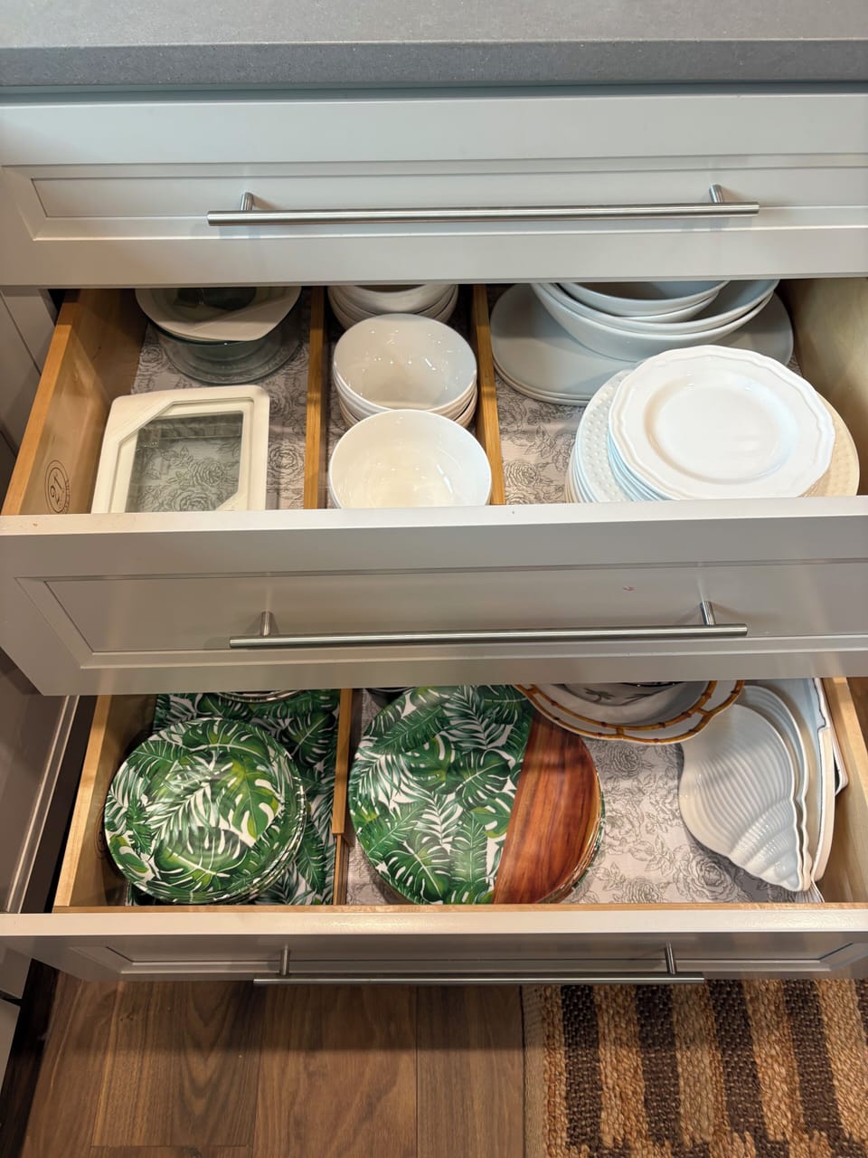 Drawers complete with indoor and outdoor dinnerware...