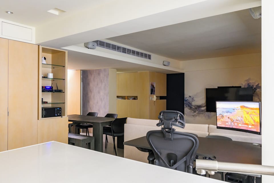 Convenient Workspace:
• Herman Miller Office Chair
• Height Adjustable Desk

