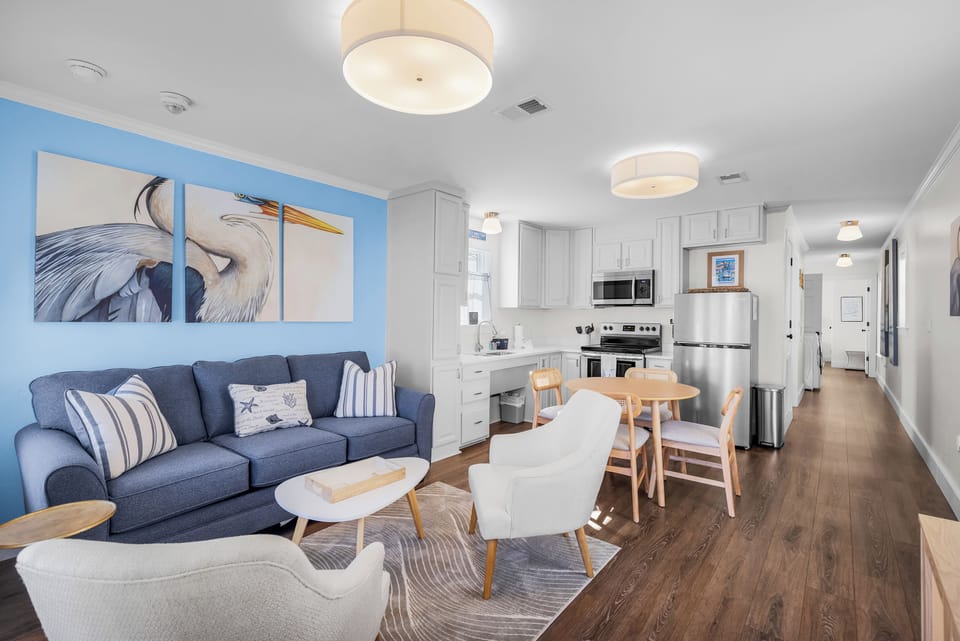 Open concept living room, kitchen and dining area