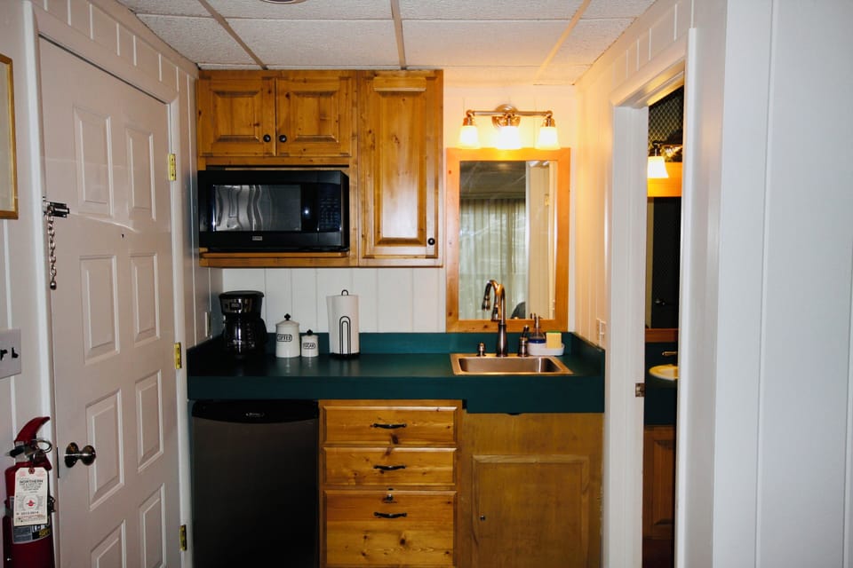 A well equipped kitchenette for meal preparation.