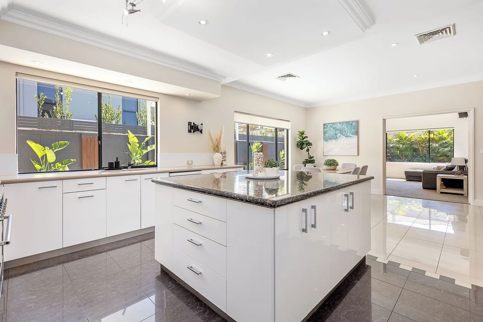 Spacious luxury retreat with coastal decor, spotless interiors, and style.