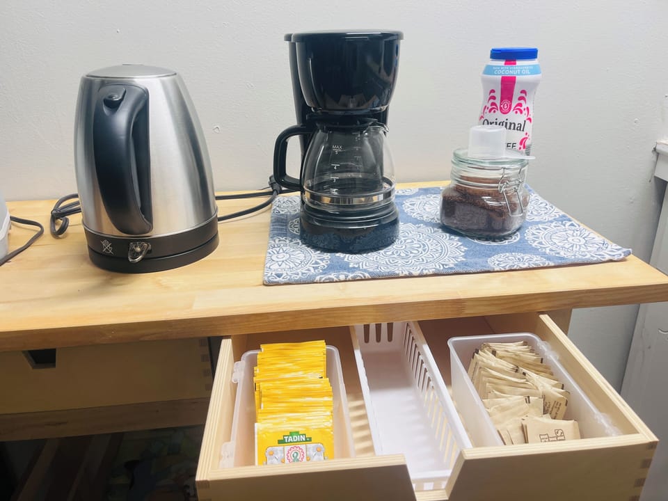 Coffee, creamer and sugar provide