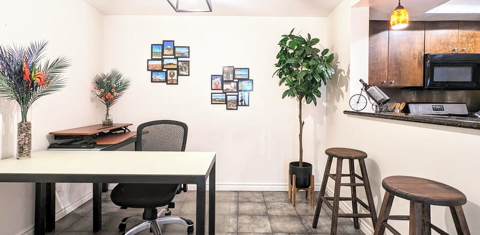 Workspace w/a Herman Miller Sayl chair & standing desk converter. 