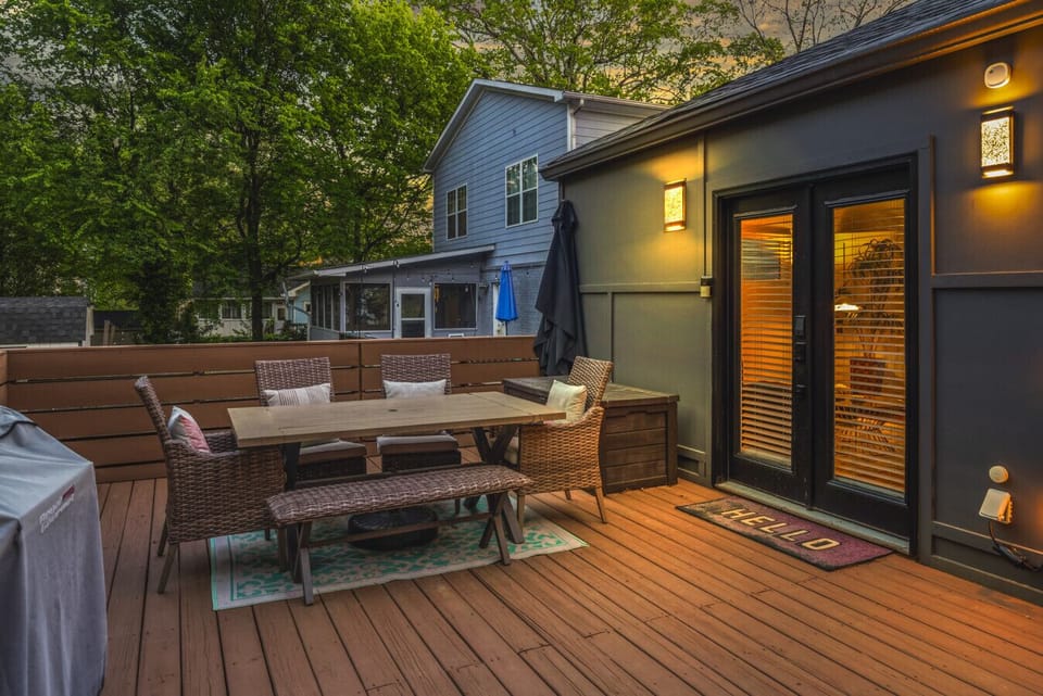 Living area opens to the back porch for seamless indoor/outdoor living.