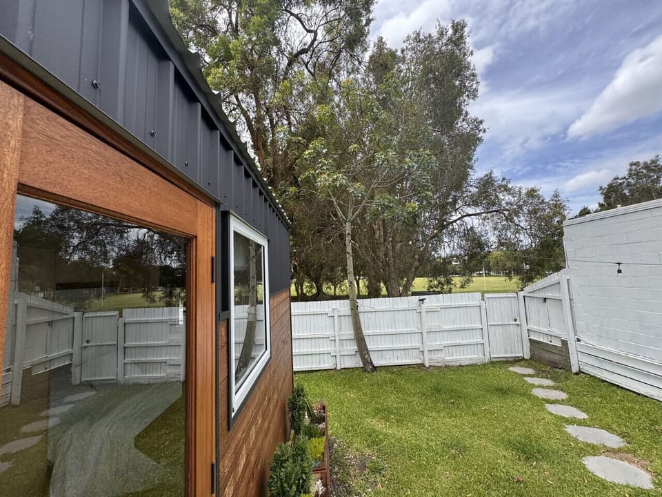 Your back yard and tiny home privacy with surrounding fence.