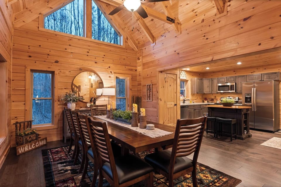 Large dining room table seats up 10 people. Night photo