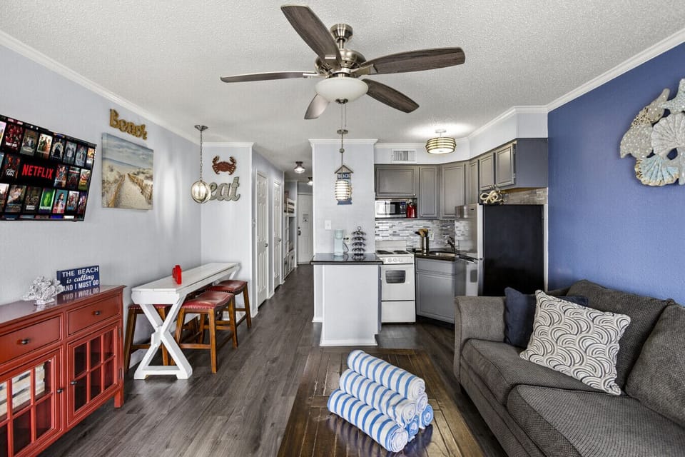 Charming dining nook with beach-inspired decor accents.