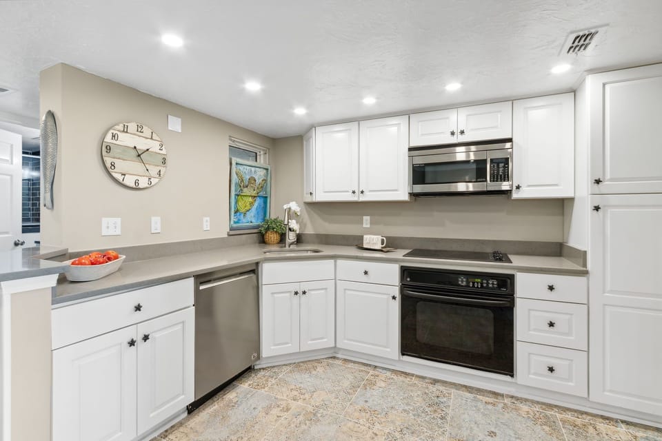 Fully Equipped Kitchen with Stainless Steel Appliancese