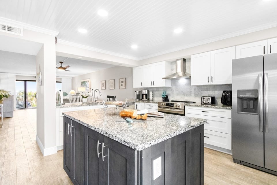 Fully stocked with top quality appliances for easy meal prep.