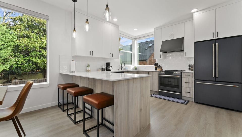 Gourmet kitchen with island bar