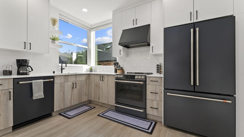Kitchen with black stainless appliances