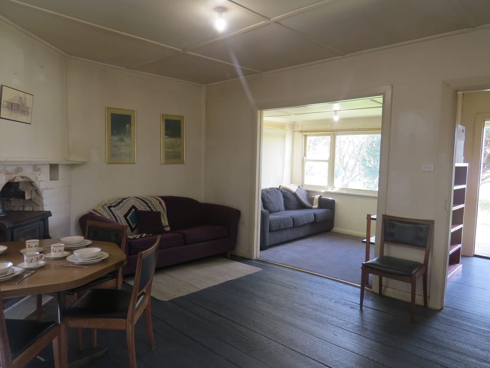 Sun room and cozy lounge with woood heater. Double sofa bed on request.