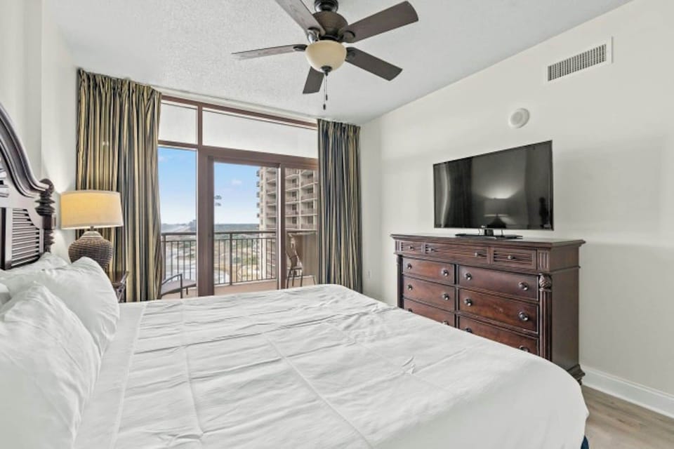 Awaken each morning to gorgeous views from the primary bedroom.