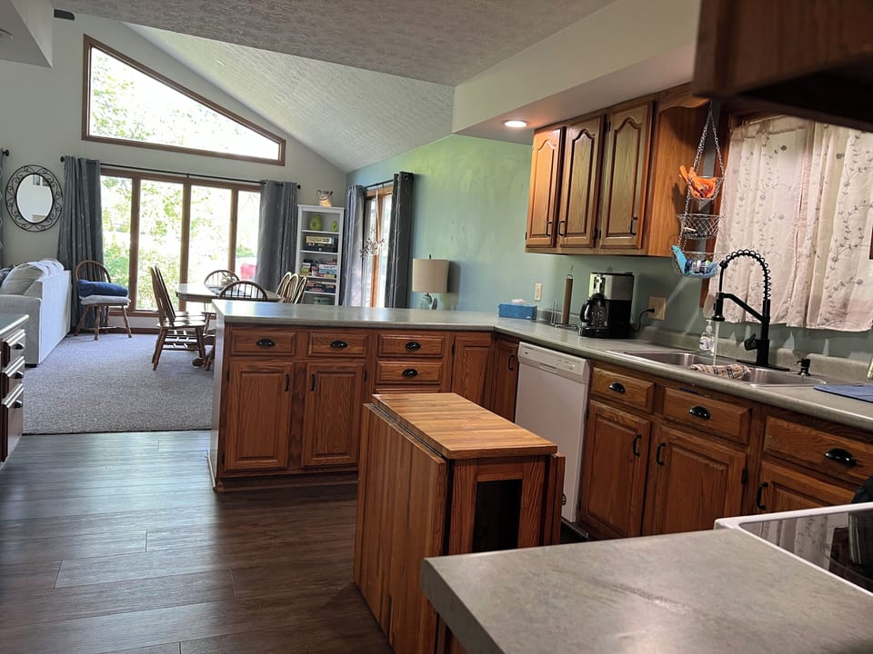 Kitchen and view of dining realizing