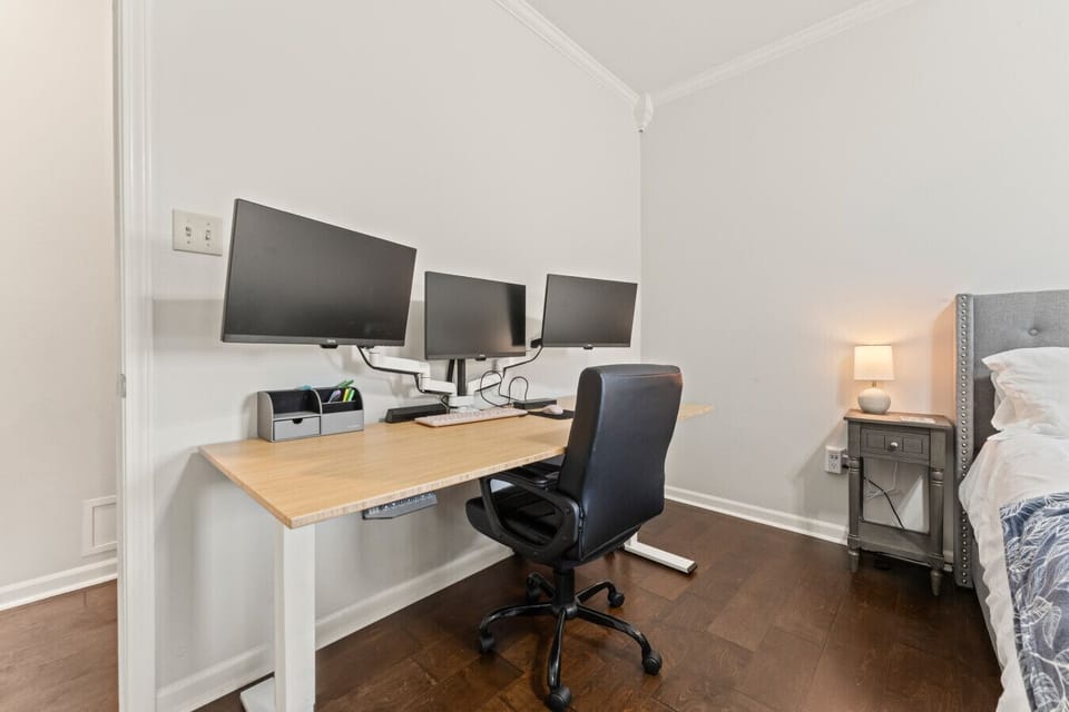 Home Office: Bright and modern workspace with dual monitors for seamless productivity!