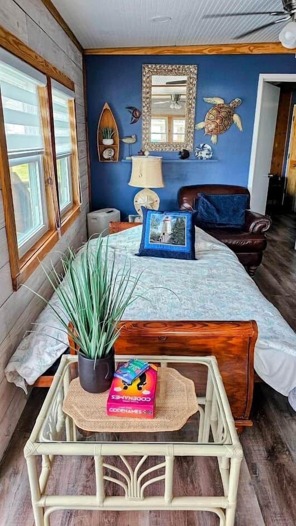 Futon Couch made into queen size Bed with plenty or space around it.