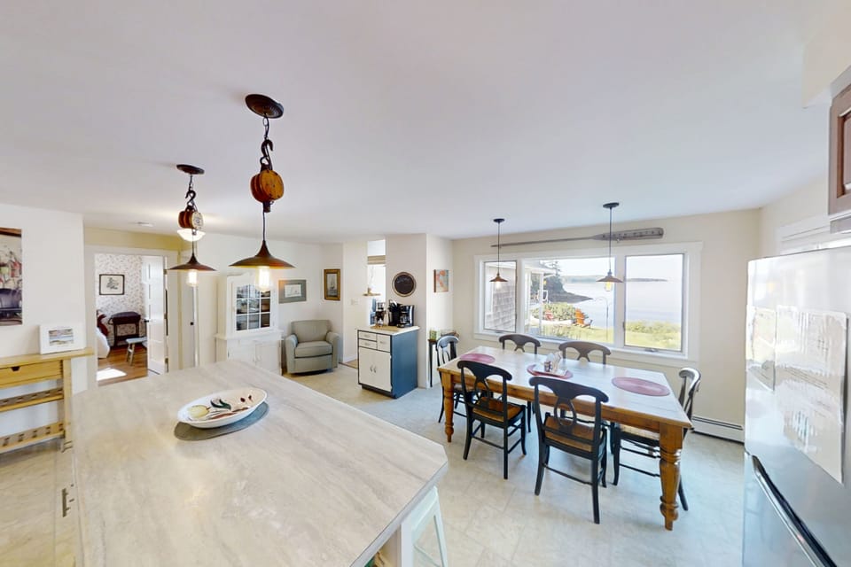 Alternate view of open dining/ kitchen area.