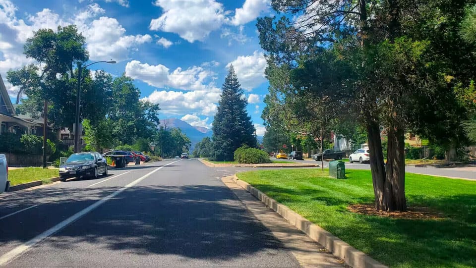 Enjoy our tree-lined street with a nice view of Pikes Peak