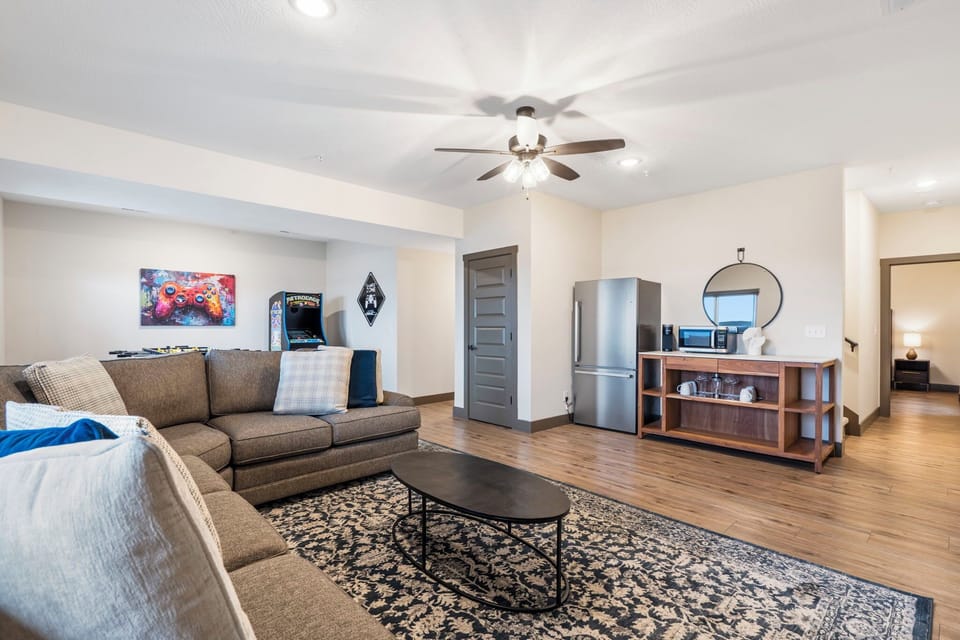 Downstairs Living Area Doubles as the Rec Room with Cable TV, Games, Additional Refrigerator and Microwave, Patio Access