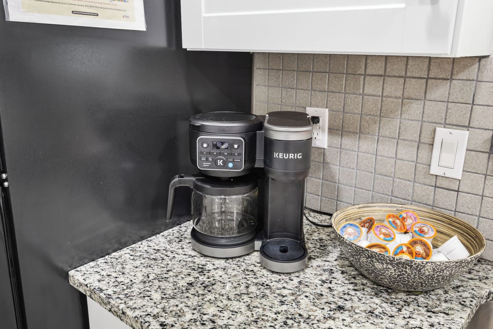 Morning made easy with a Keurig + drip coffee maker and complimentary K-cups. 