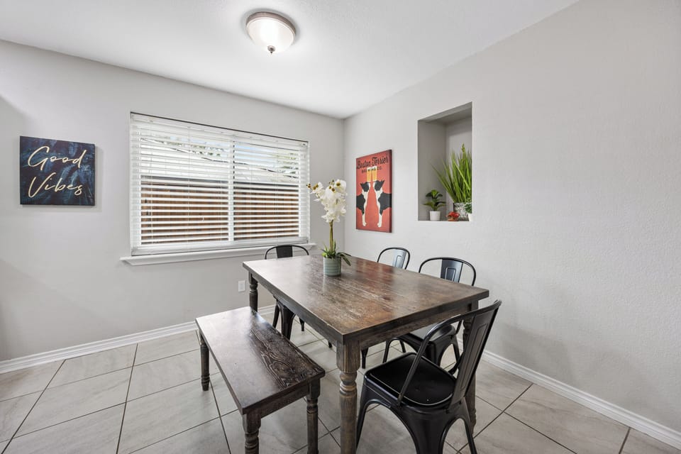 Cozy dining space with seating for six, perfect for shared meals and family chat