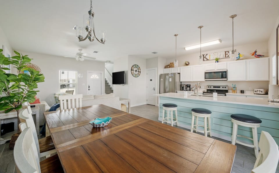 Dining room for eating or game night. Full kitchen and lounging living area.