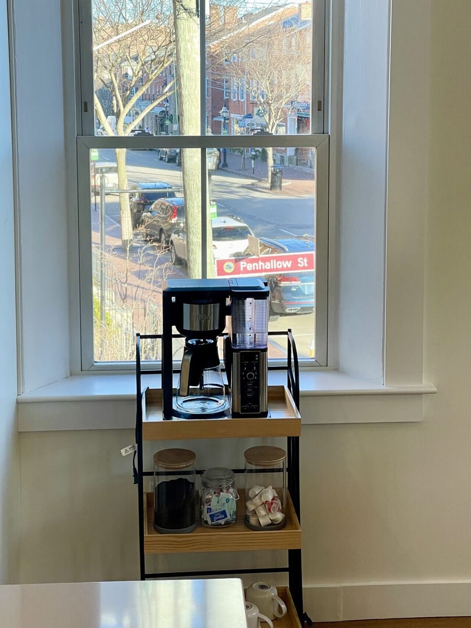 Coffee bar with grounds, creamer, and sugars provided. Tea and hot water also available.