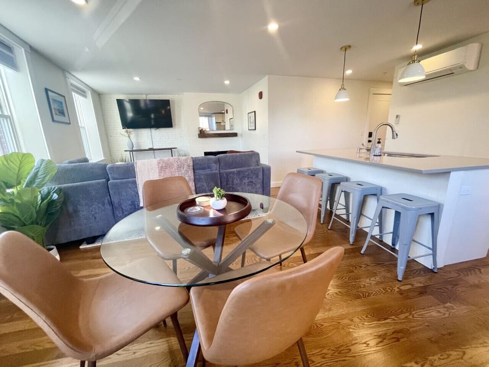 Open concept kitchen, living, and dining area.